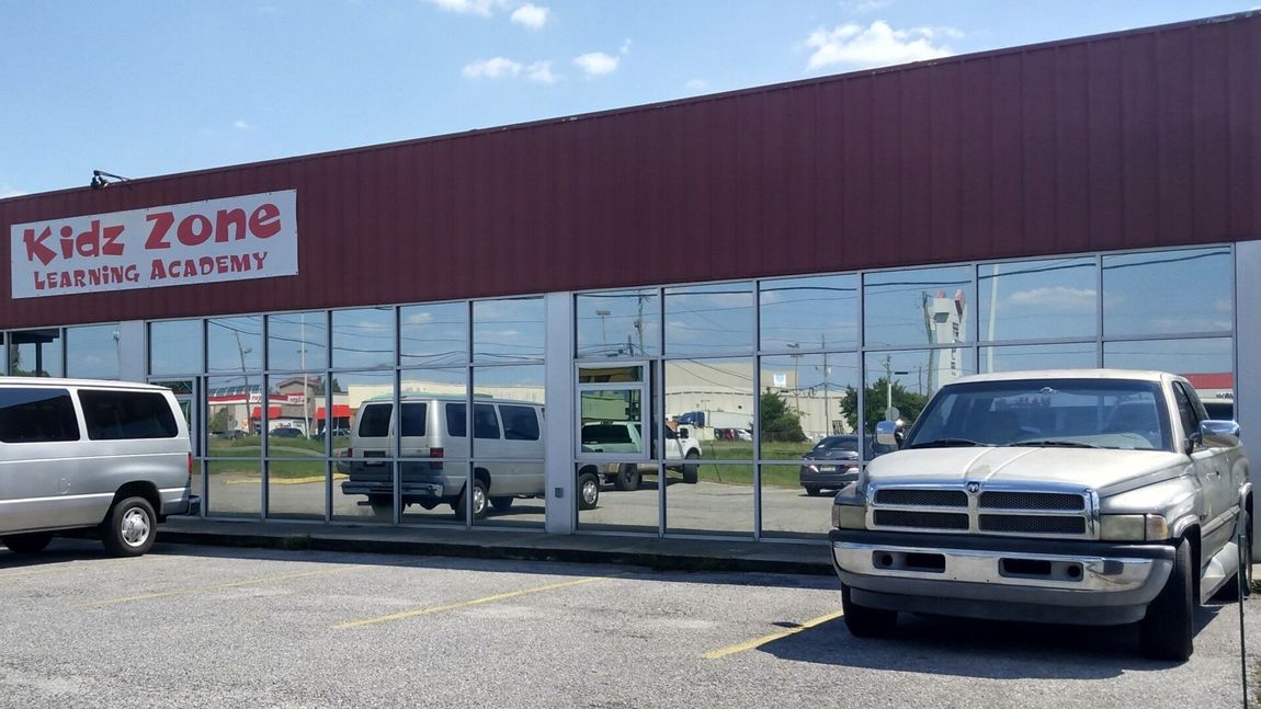 Building window upgrade - SPF ULTRA energy efficient office tint cuts power costs adding the right environment inside Kidz Zone Montgomery AL