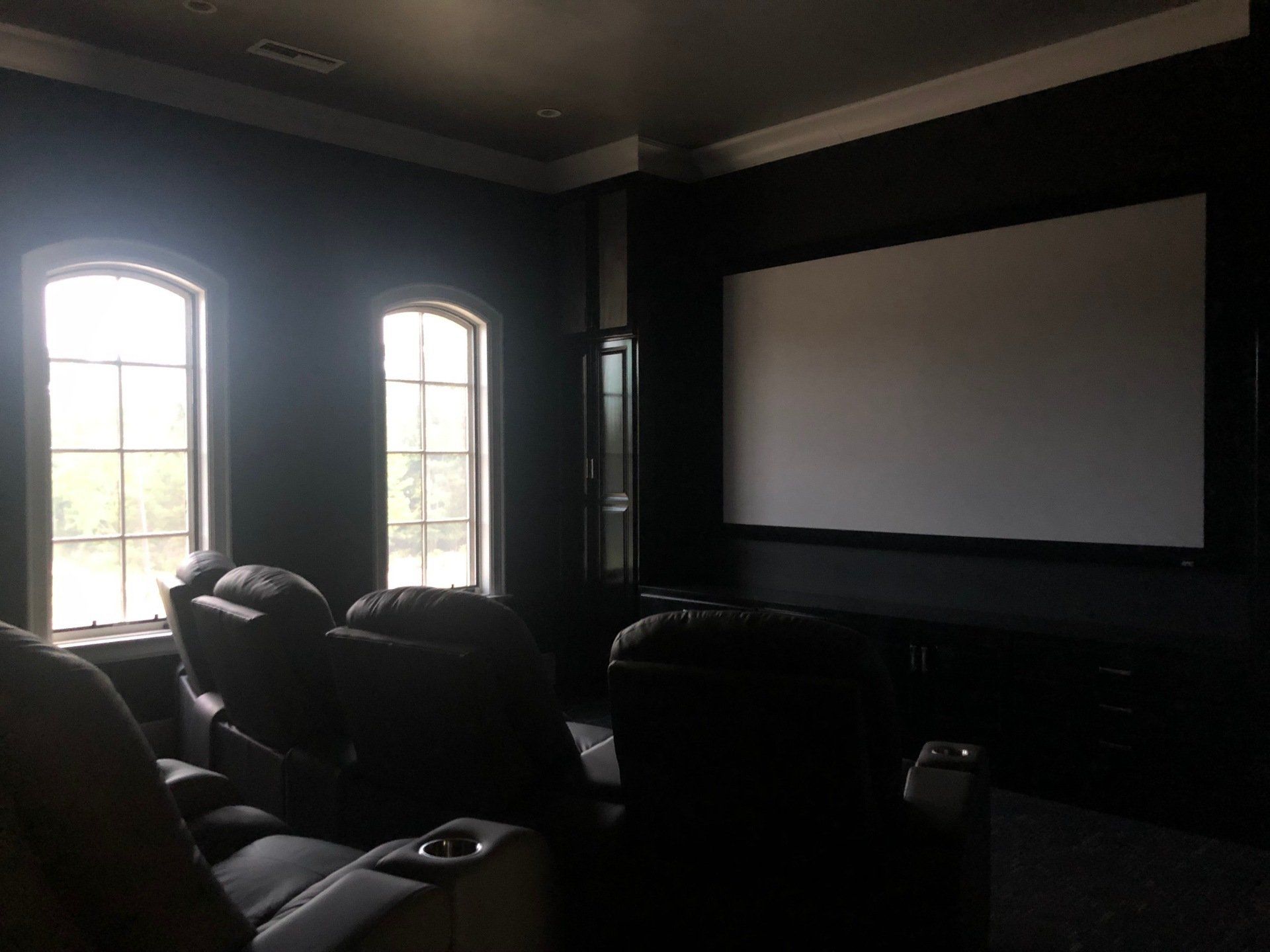 Home window tinting in Birmingham AL - SPF home window tinting service created the perfect setting in this home theatre in Birmingham, AL