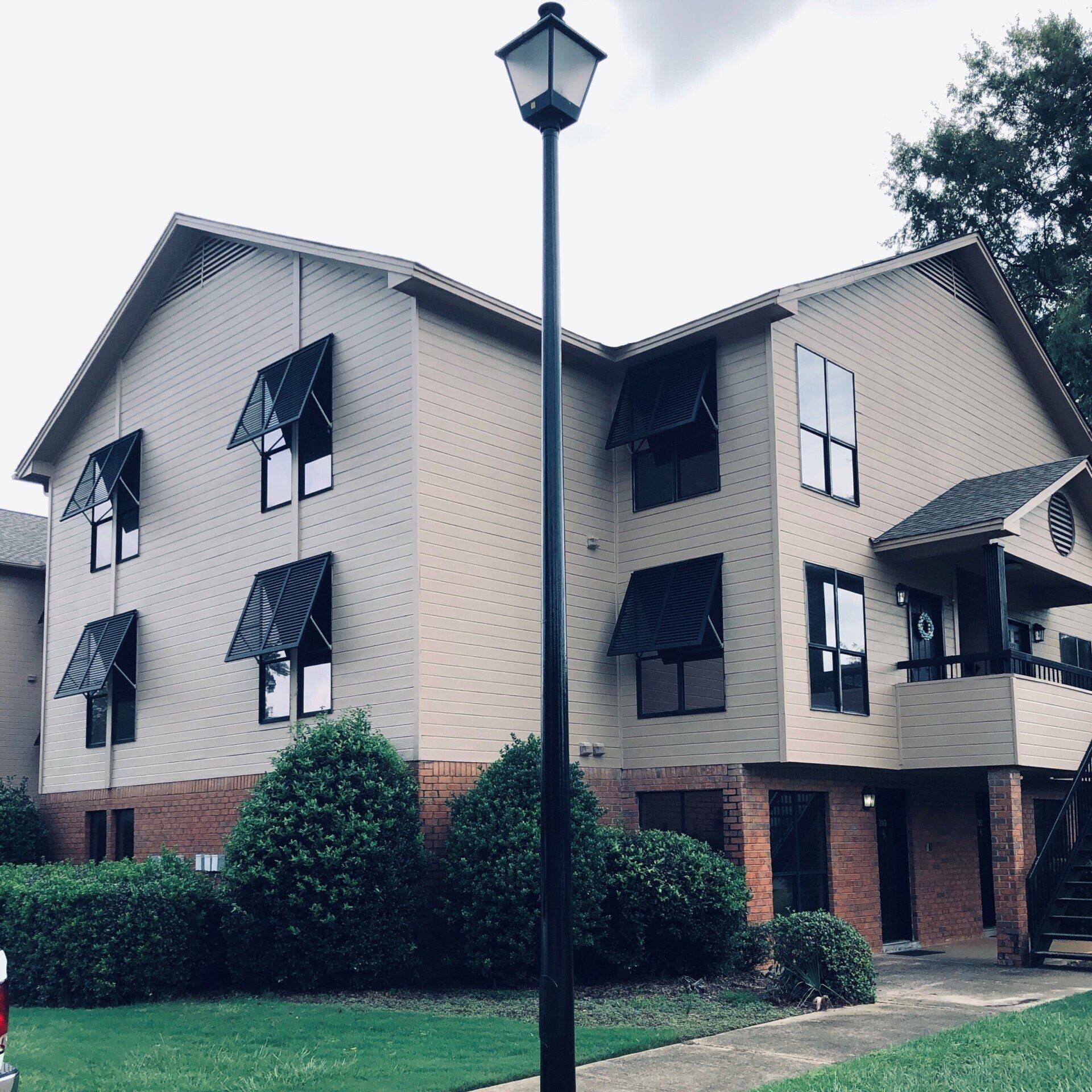 Home window tinting service - After 74% Heat Rejection & Storm Security was added with SPF Home Tint for building 3 of Arbors on Taylor apartments in AL