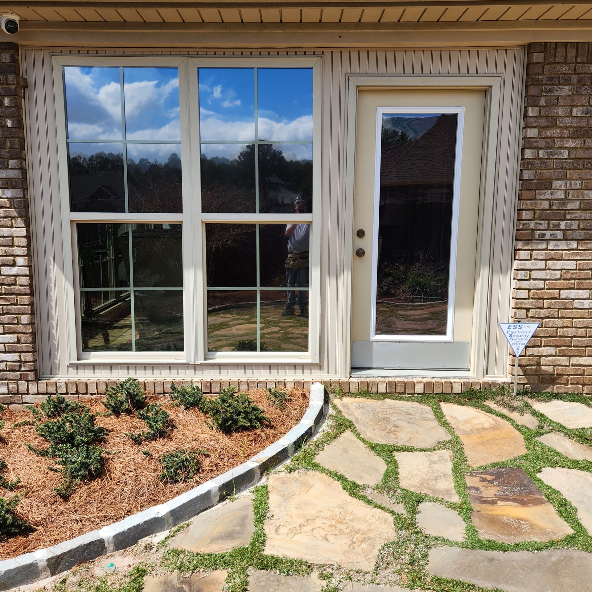 home sunroom window treatment - SPF home tint blocks maximum heat with bright Sun from flooding these Sunroom windows in Prattville AL