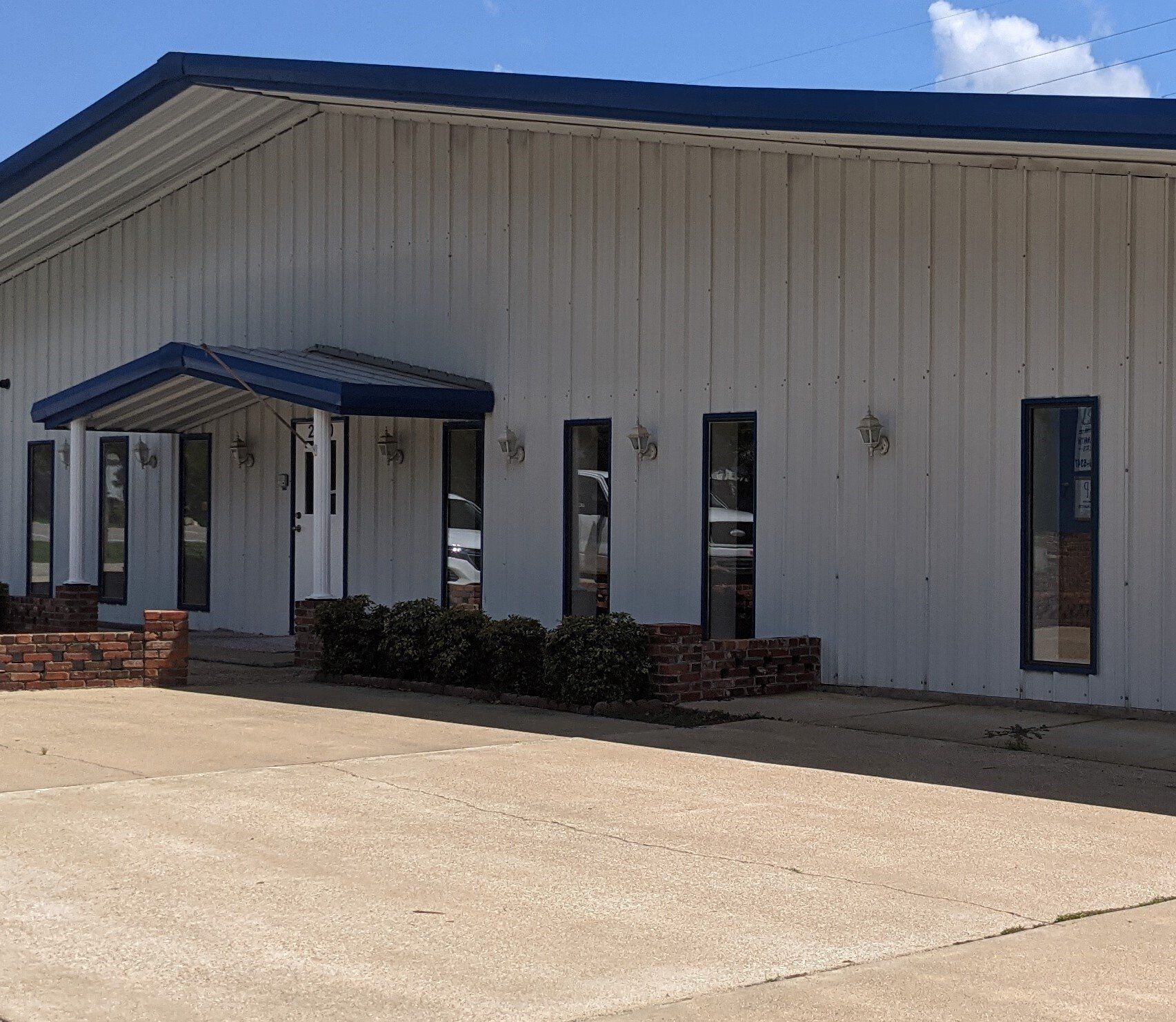 store window tinting in AL - Heat & Bright Sun were out of control inside this office in central Alabama.