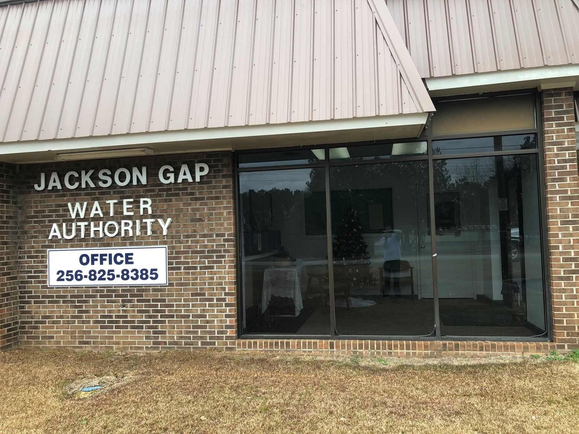 business window tinting at Lake Martin in Jacksons Gap - Now OVER 90% Heat & Glare has been eliminated after SPF Performance Tint installed to the office windows and door.