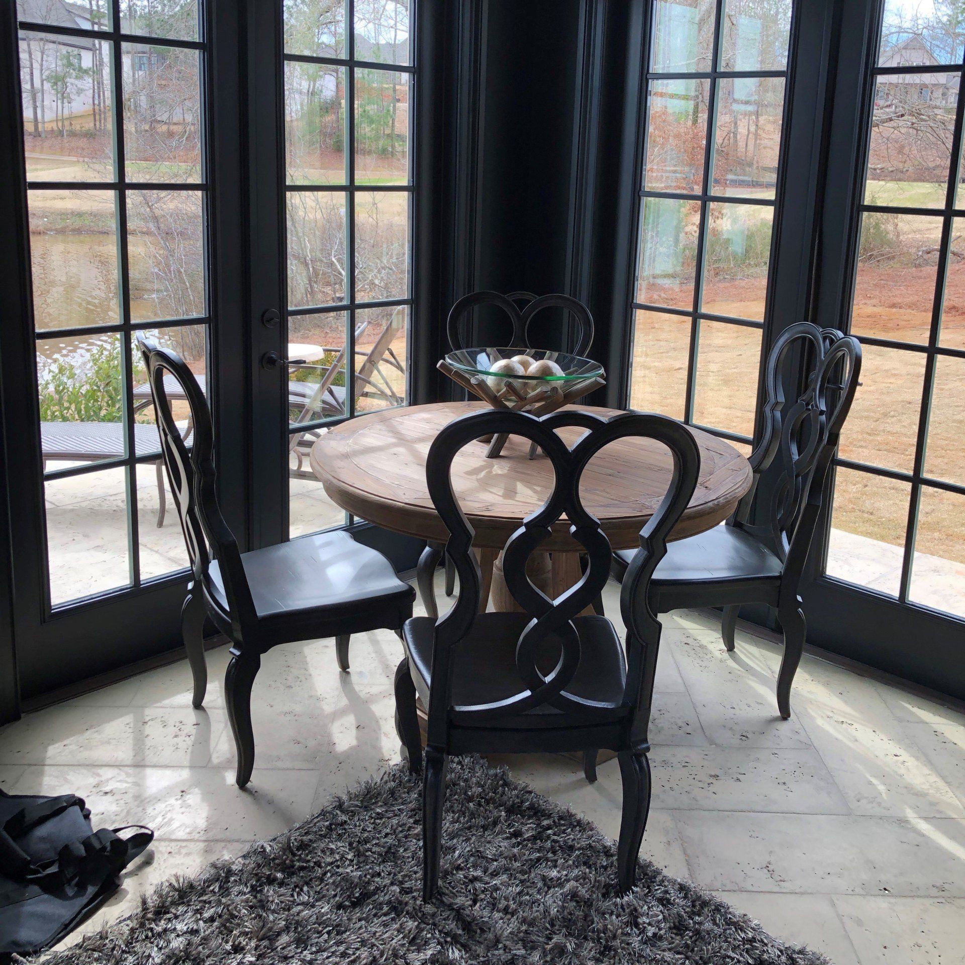 Professional home tint installation - Sun pouring in on floors and furniture before home tint installed in Auburn, AL