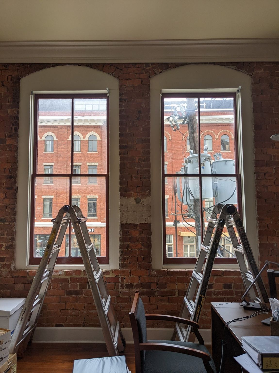 windows without SPF tint allowing too much heat inside, Bright glare disruptions and UV-radiation were amongst the Solar heat rays intruding, before SPF office tint.