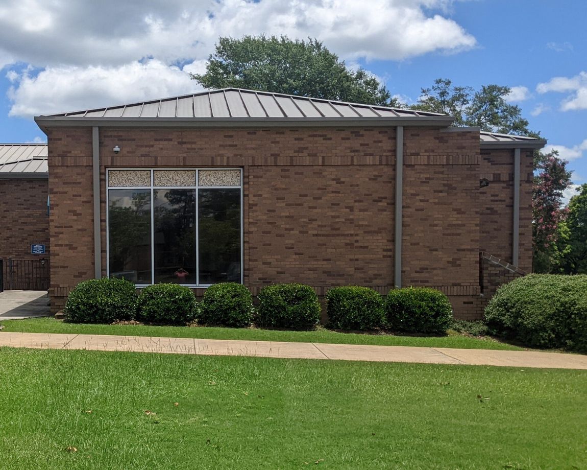 Eastmont Church windows before fake tint removal to be replaced with real SPF Tint in Montgomery AL