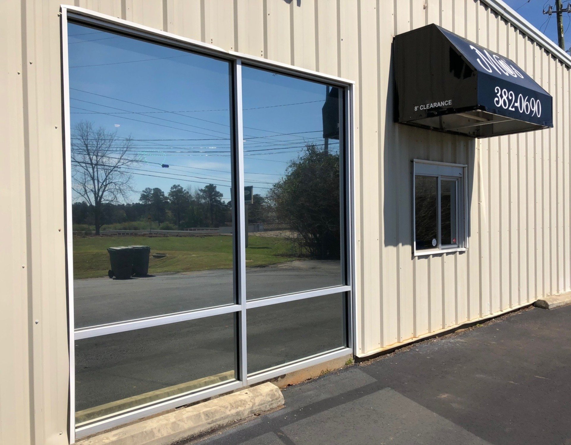 Tinted Storefront windows blocking massive amounts of heat and glare - business tinting in Greenville AL