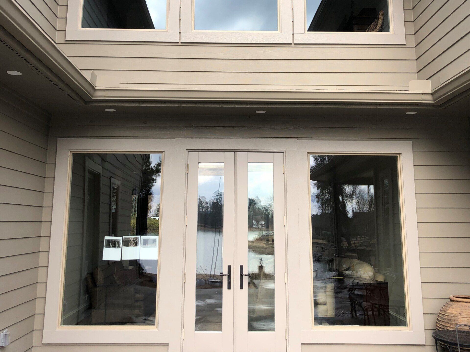 lake house tinting in Alexander City - unmatched UV-Safety and heat rejecting performance was gained with SPF Residential Tint installed to these lake home windows in Alex City AL