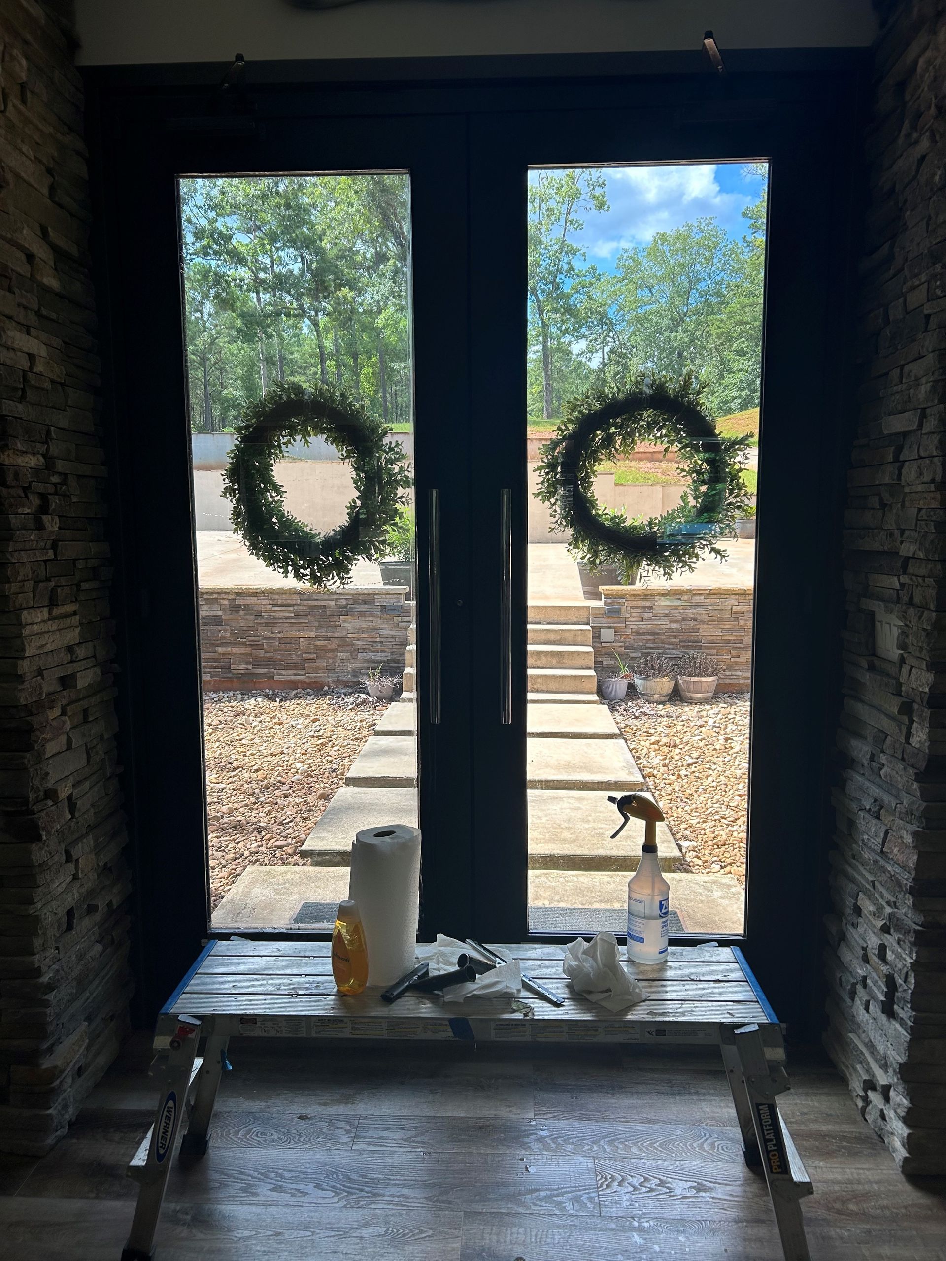 Semi-private exterior residential tint - SPF Dimmed Crystal Tint blocked most heat with Sun glare from home glass door windows. Auburn, AL
