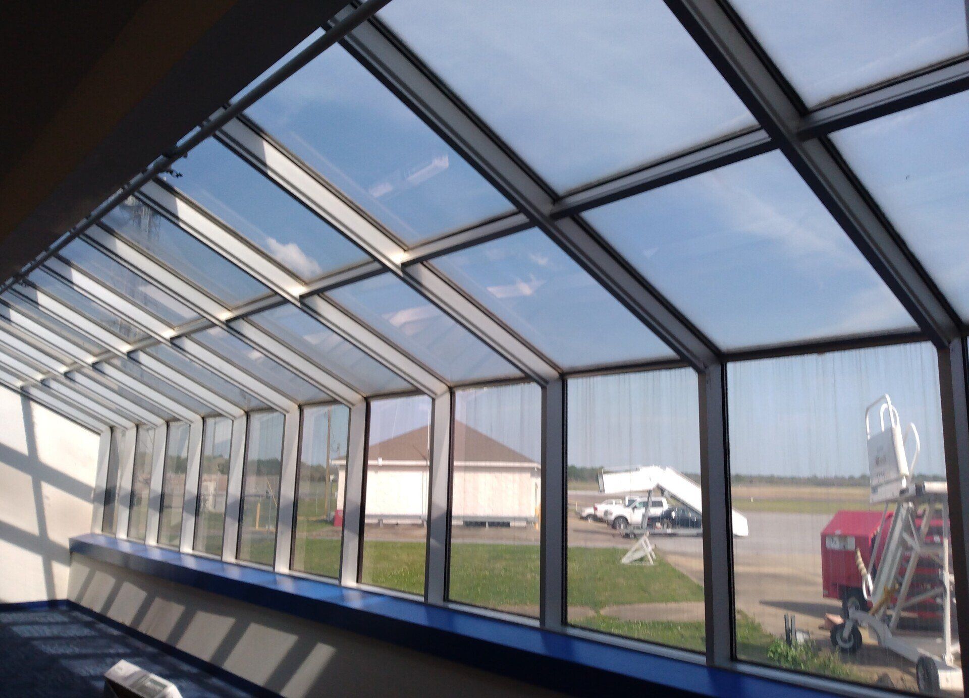 window renovation adds energy efficiency - Industry-Leading performance achieved in record 91% Bright Glare & Heat Blocked from Airport windows. SPF Tinted in 2022. Montgomery, AL