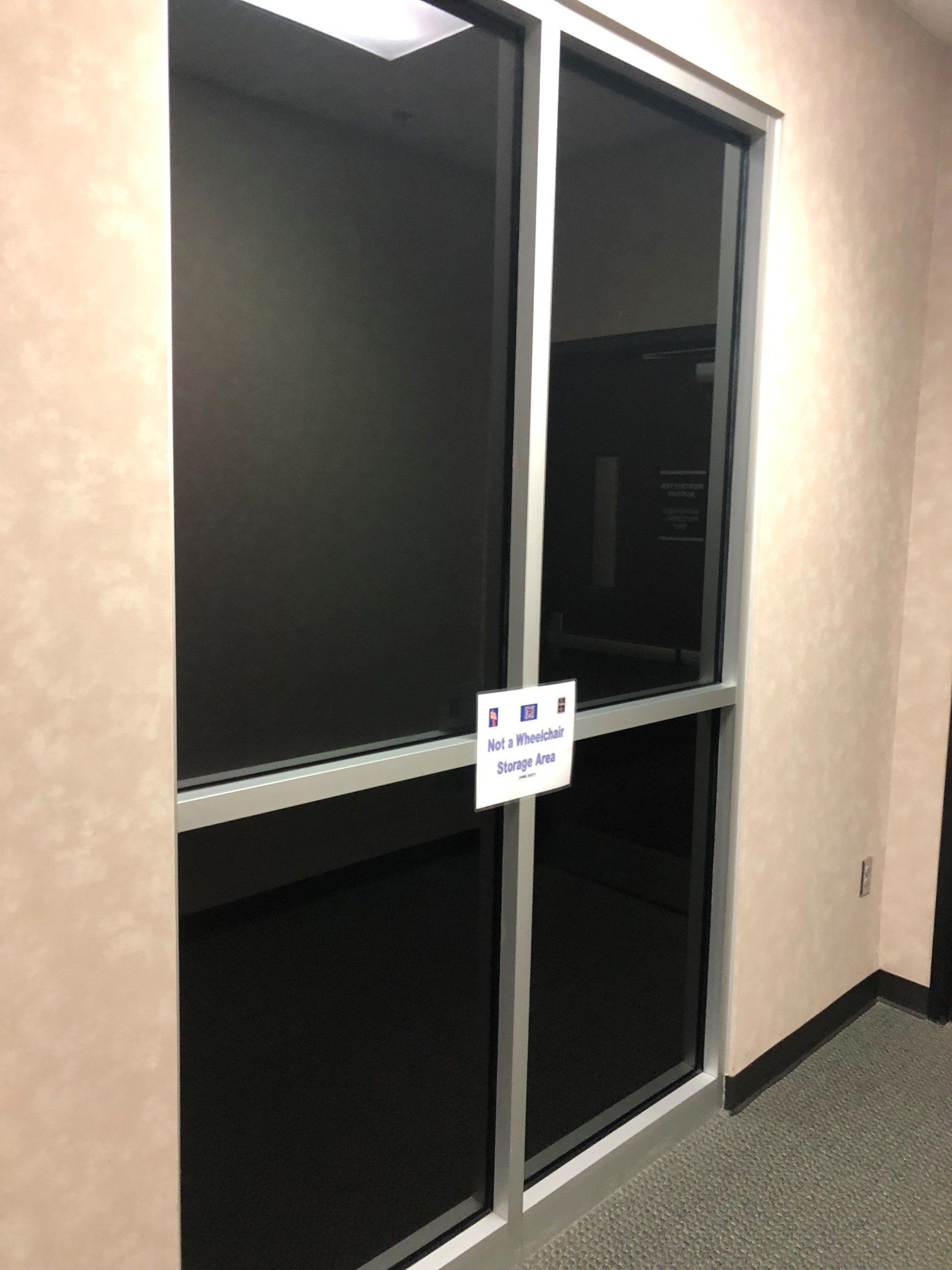 Professional tint installed to hide interior room in office building - business tint Alabama