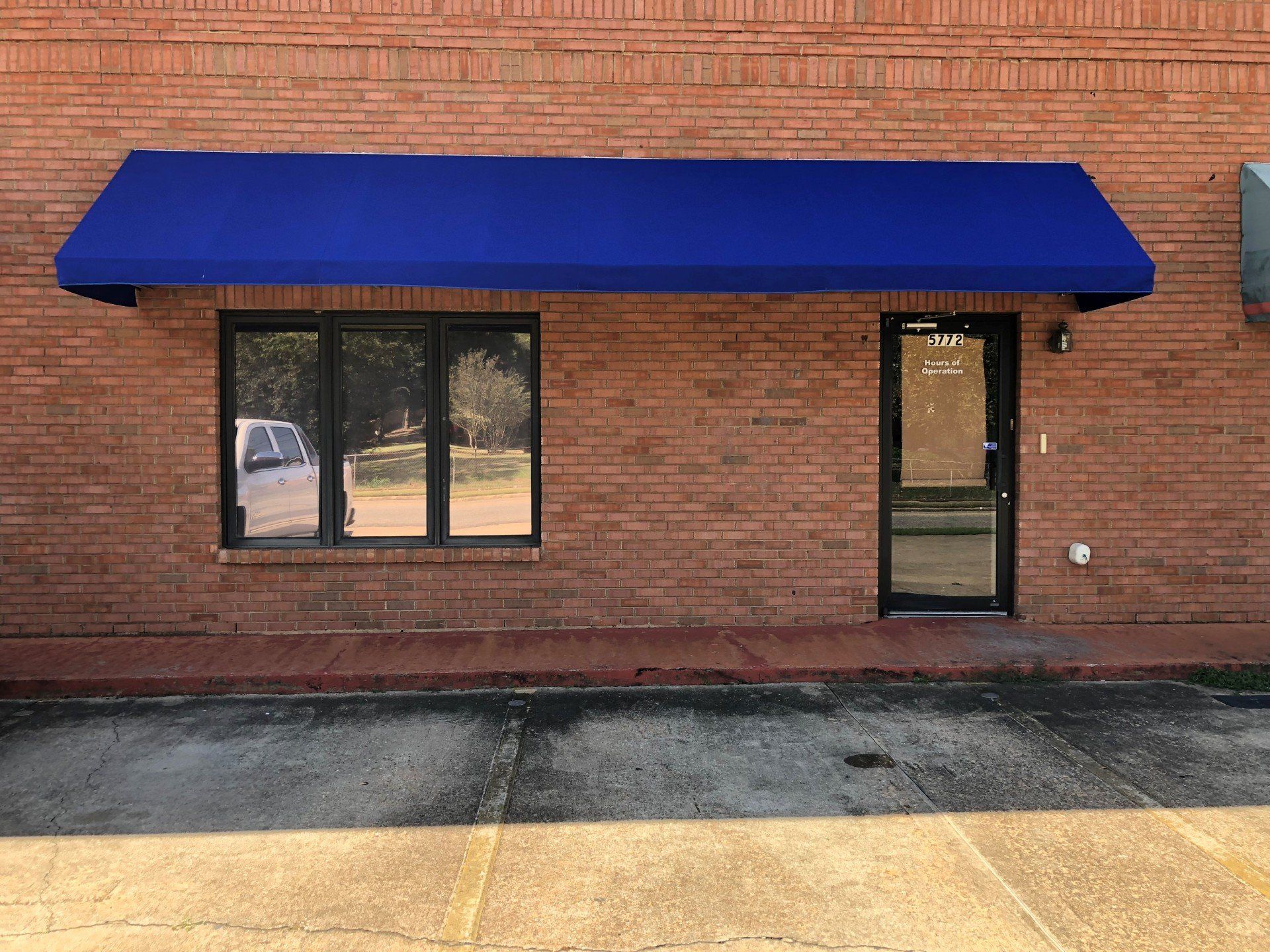 Commercial Tint Montgomery - before Tint was removed and replaced