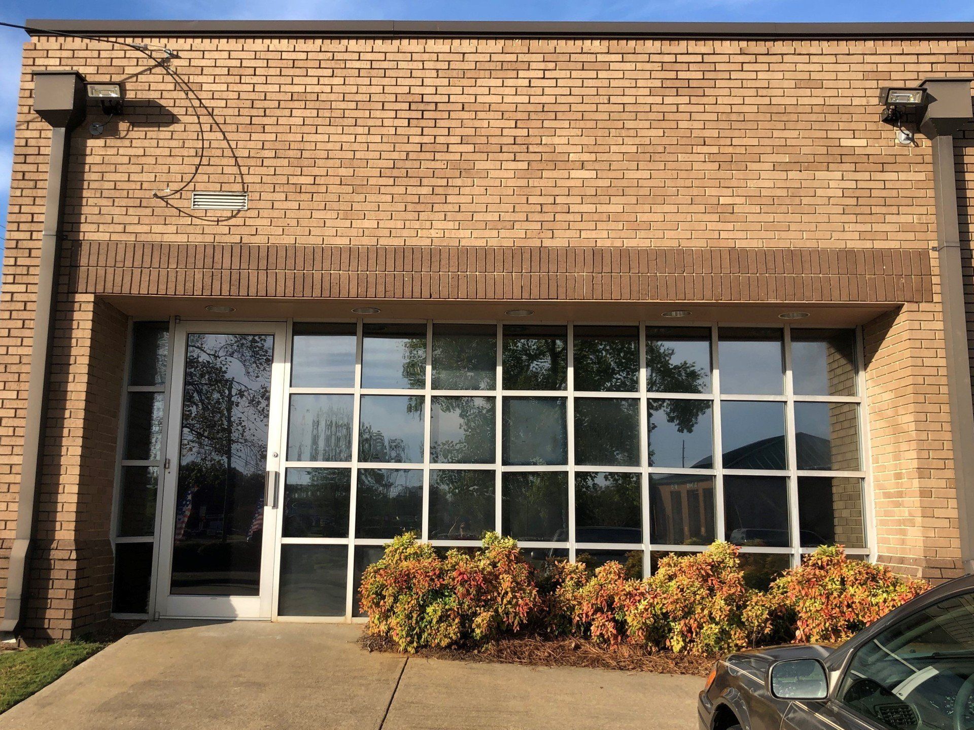 After SPF Preferred Performance Tint was installed to this bay of windows at the Fire Department, gaining light, heat, & UV reduction/rejection.