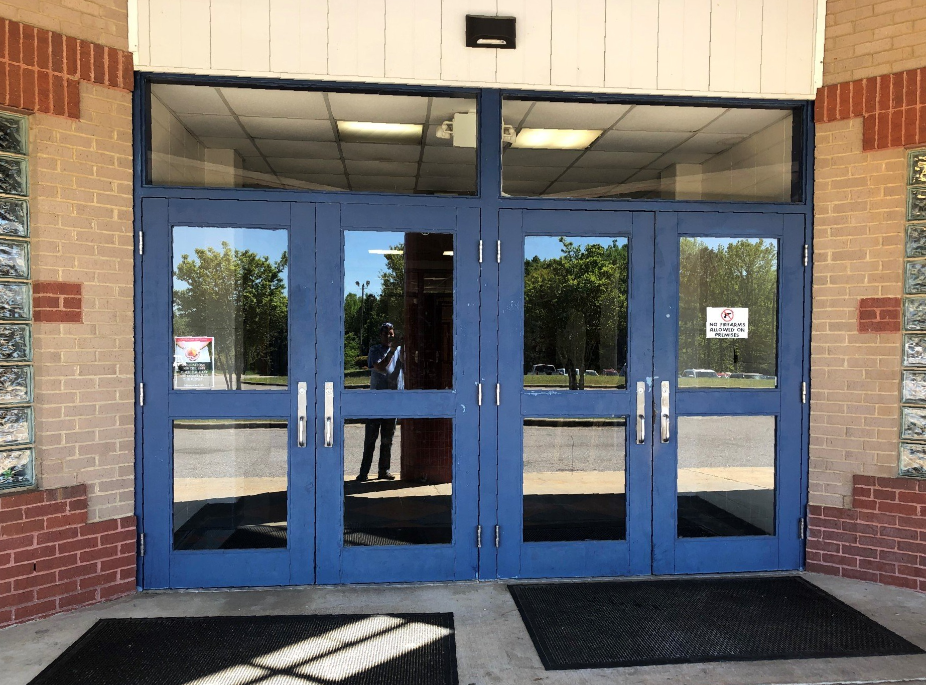 Before SPF Tint installation to the glass doors at Jemison Elementary School on 4/15/2019.