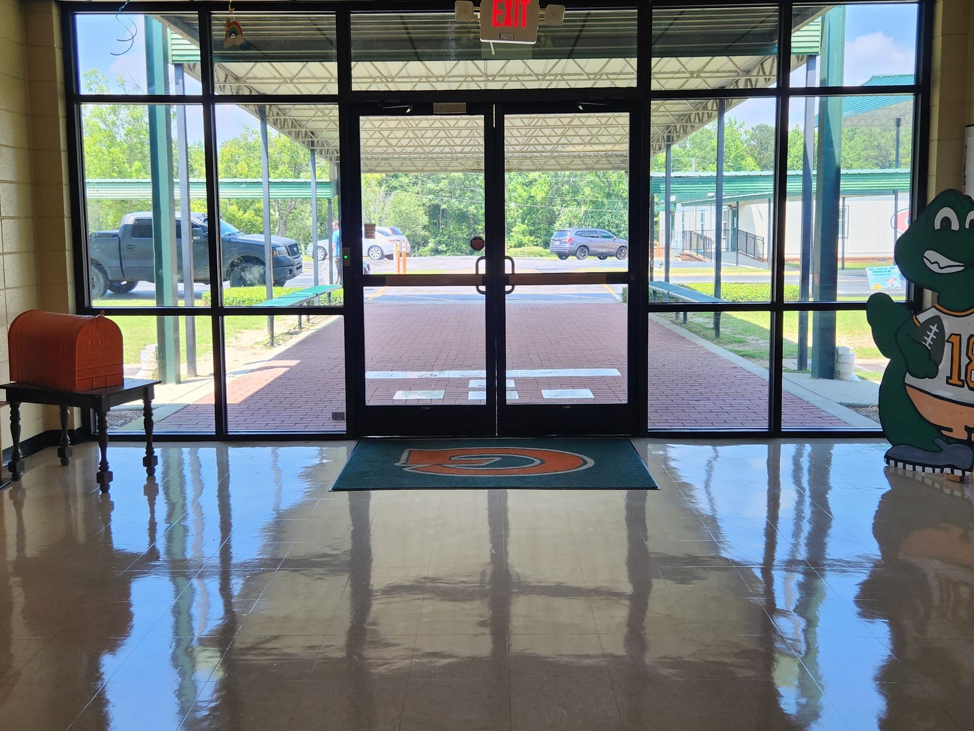 Security tint Auburn Opelika Smiths Station AL - the school is protected from an armed break-in or forced entry. Additionally Solar Heat gain and Sun glare was cut adding comfort with visual clarity inside.