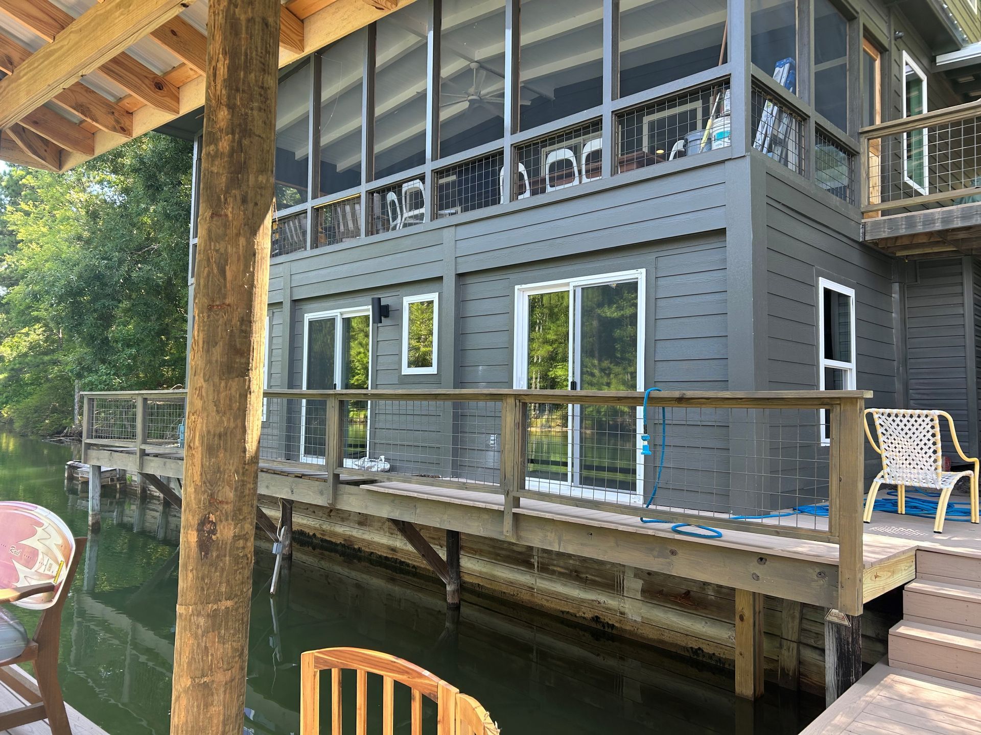 home window tinting - SPF' Residential Tint blocks heat with UV Sun glare from entering windows at Lake Martin. Eclectic, AL.
