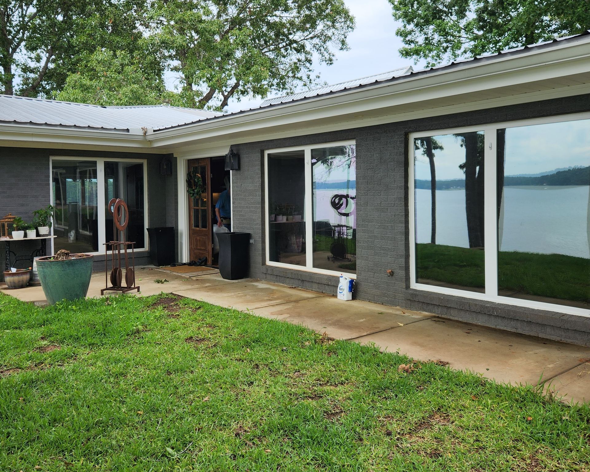 window tinting in Deatsville - Maximum heat with bright UV Sun glare was blocked from entering home windows. After SPF Dim Crystal home tint at Lake Jordan