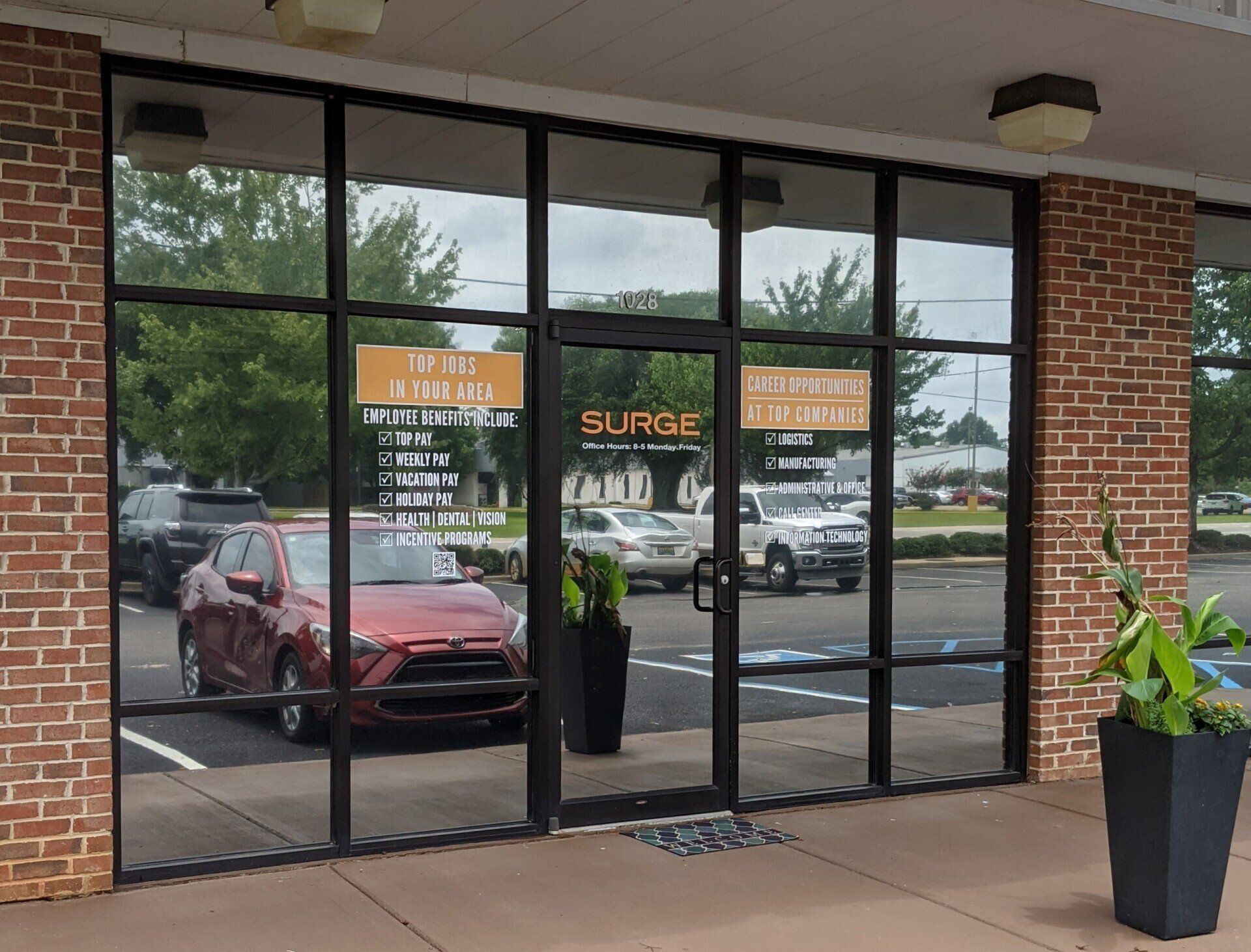 Office Window tint treatment in Prattville AL - SPF Performance storefront tint blocked heat adding real energy efficiency at Surge Staffing in Prattville, AL
