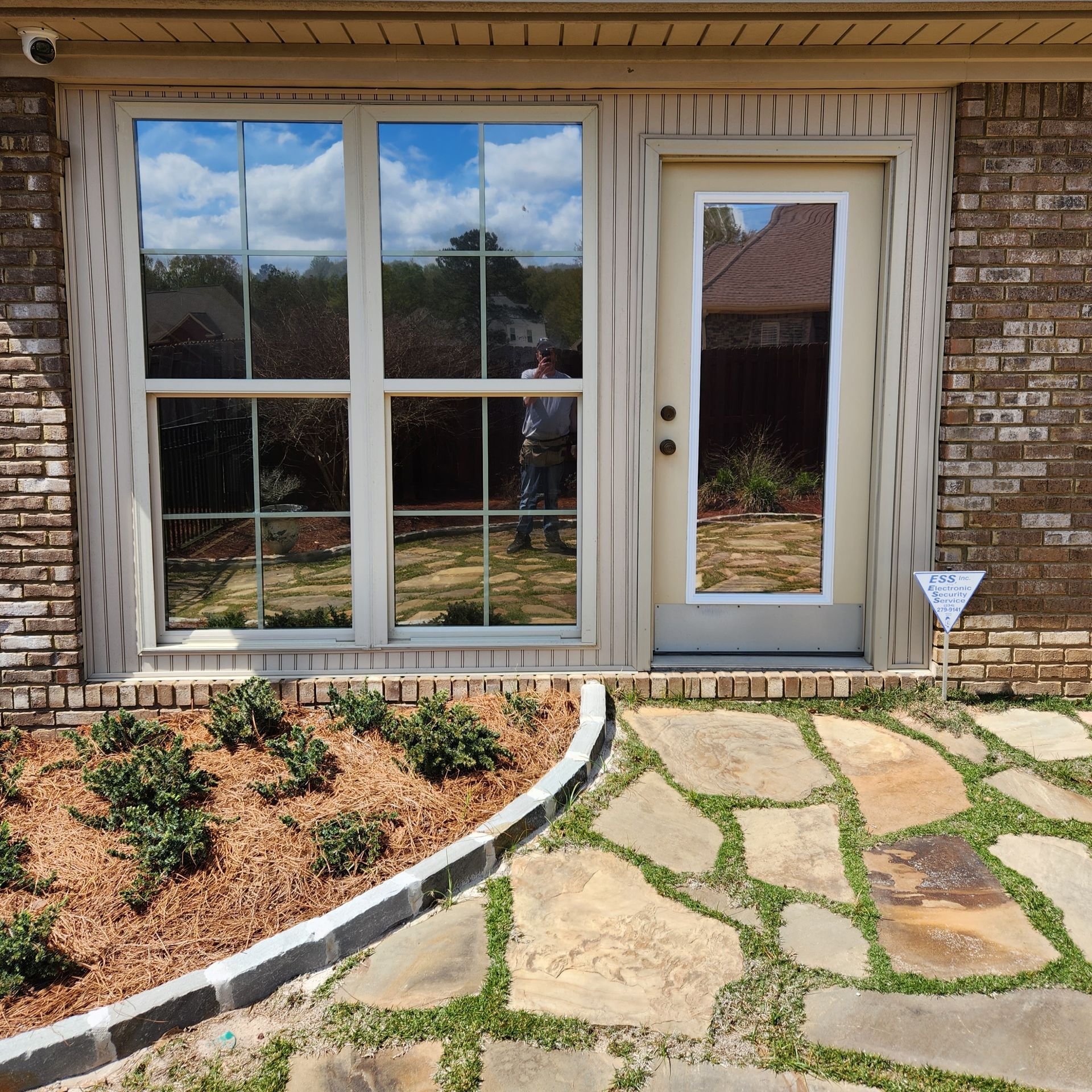 home sunroom window treatment - spf tint blocks maximum heat with bright Sun from flooding the Sunroom in Prattville AL