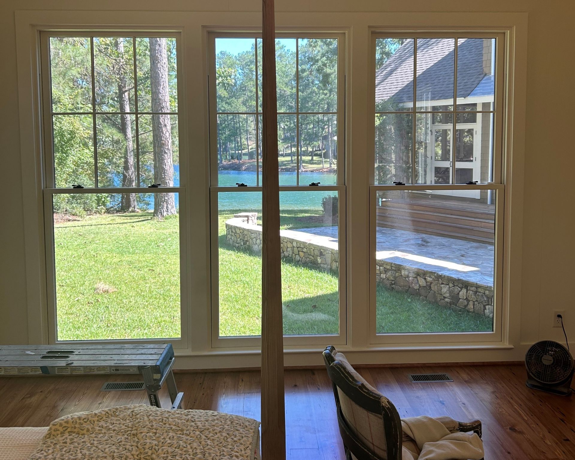 SPF Crystal Clear Window Tint kept 2-way visibility while blocking heat gain, bright Sun, & UV-light from staining antiques and floors inside this Lake Martin home. SPF Residential Window Tinting services in Eclectic, AL