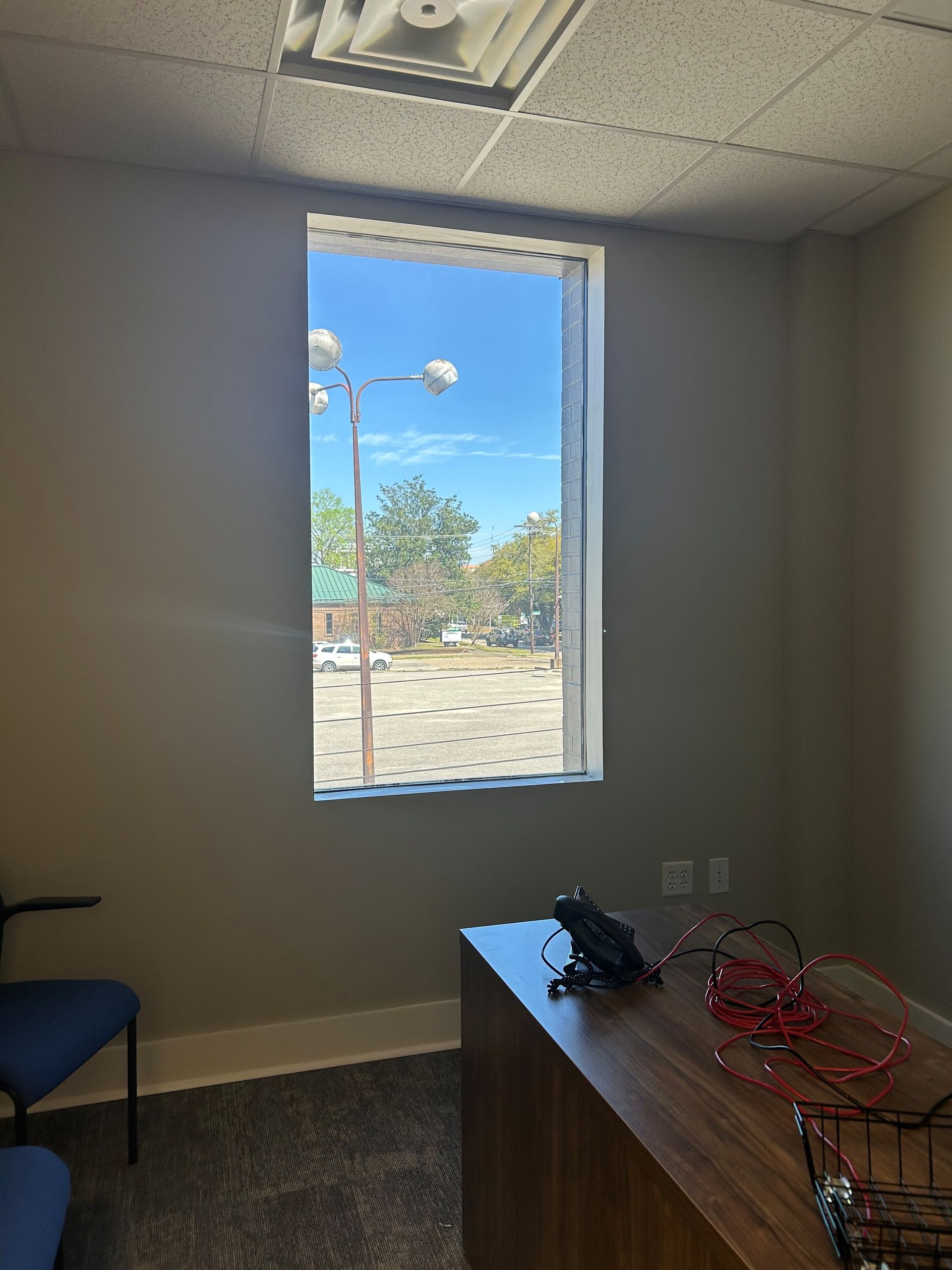 window tinting in Montgomery AL - SPF Private PLUS Tint negates the need for window coverings. Blocking bright Sun with UV heat from office windows
