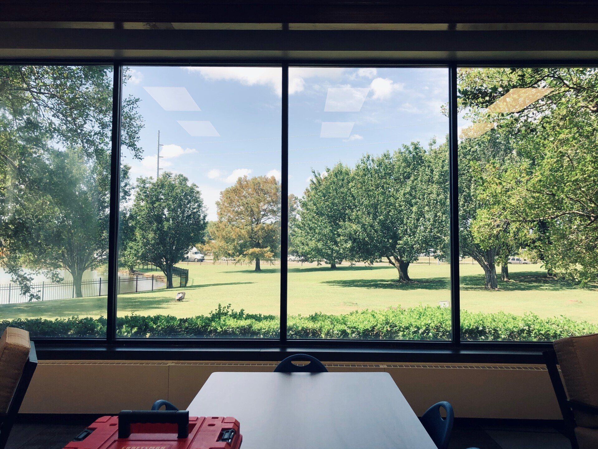 commercial tinting in Montgomery, AL - Before Over 92% Glare Distractions were eliminated allowing a great work flow for students at Lead Academy in Montgomery, AL.
