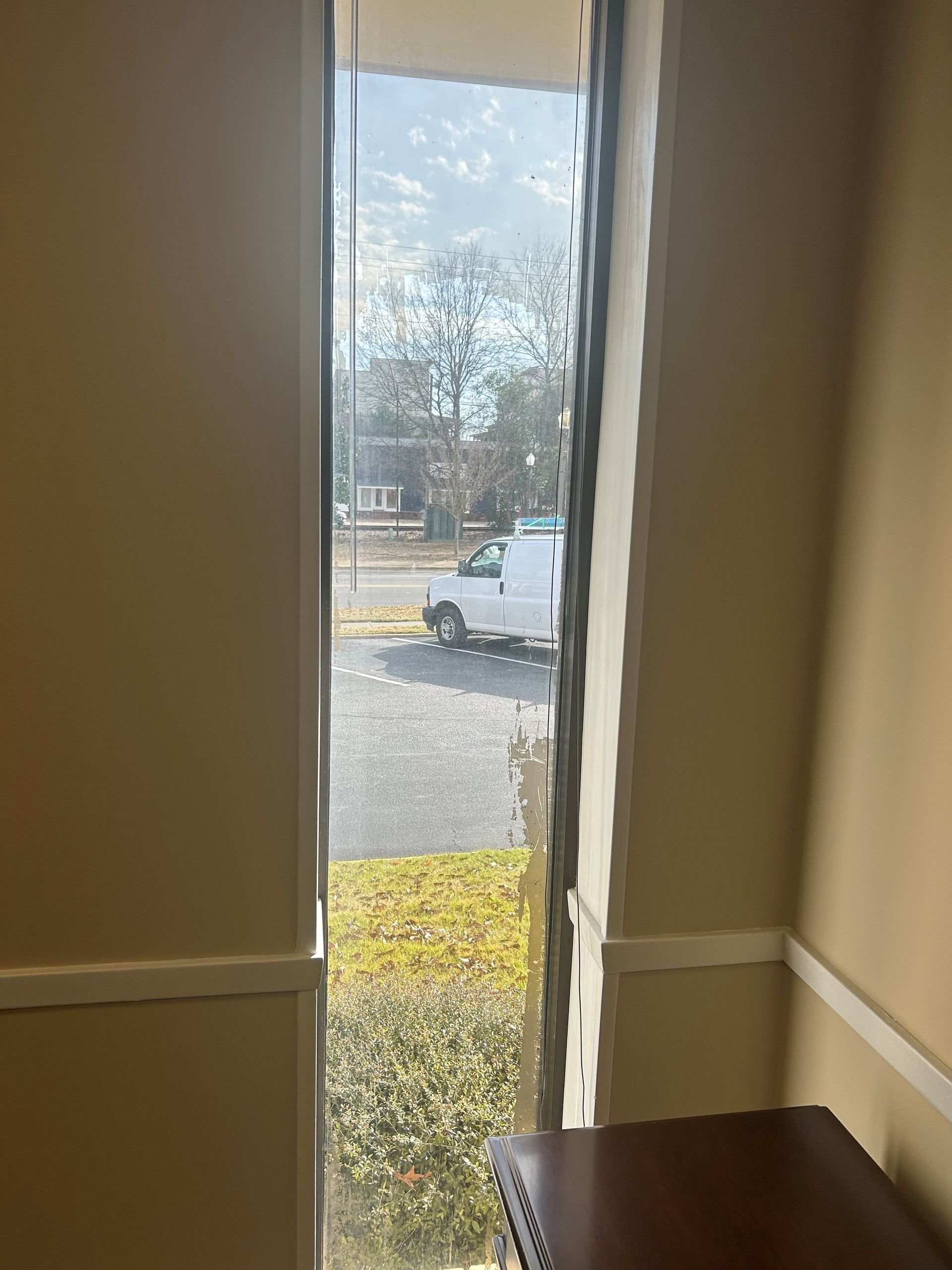 window tinting service Auburn AL - Before old tint replaced with real SPF Tint cutting much more heat & glare also full UV-harm than low-e windows in Auburn AL