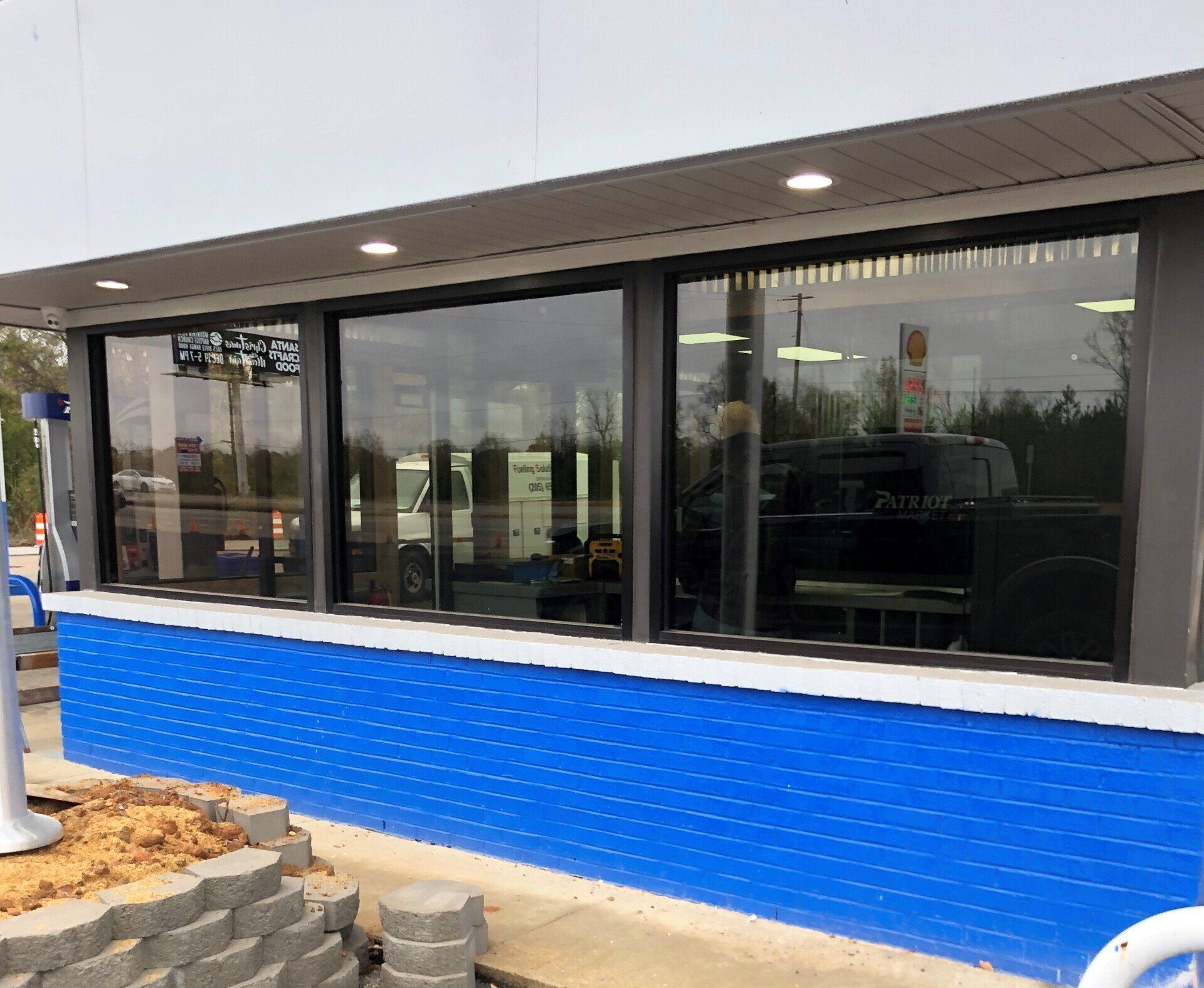 pro business storefront tint in Wetumpka AL - Before Bright Sun Cut & Heat Gain was Eliminated from passing thhrough the glass windows of this business office in Wetumpka, AL
