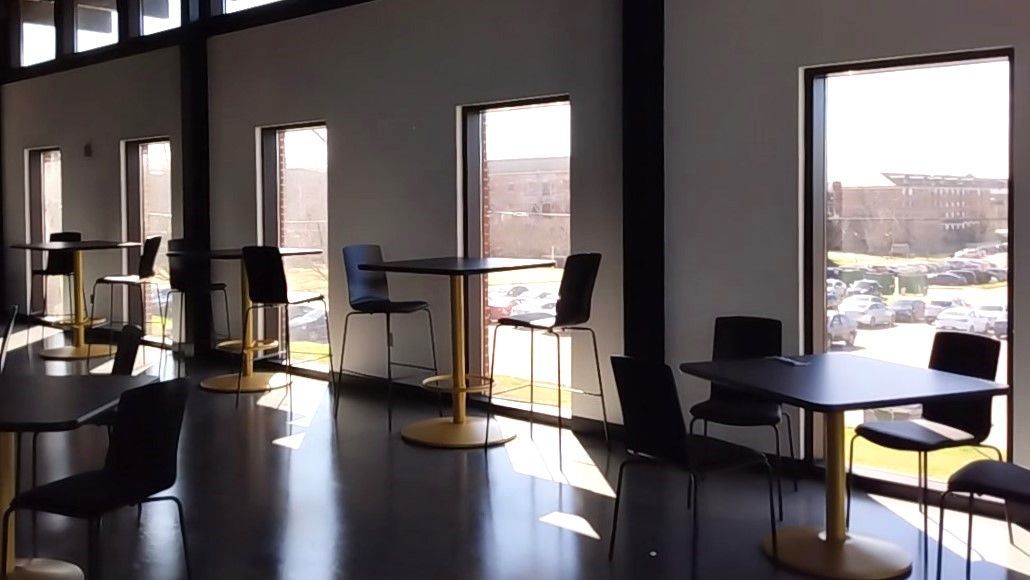 storefront tinting - Dining area was being blasted by Sun at Alabama State University. Before SPF Tint in Montgomery AL