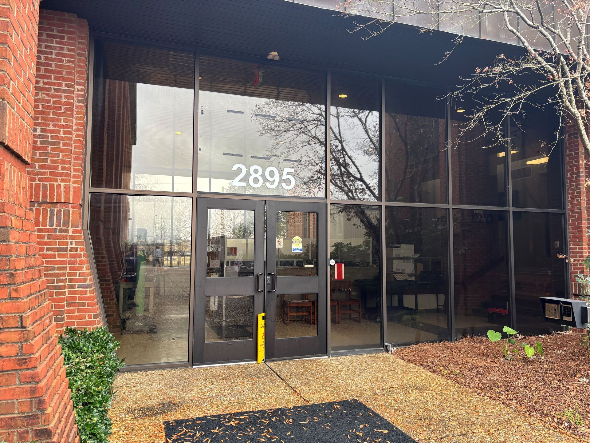 armored window security tint in Montgomery AL - spf security film plus Solar Silver tint blocks entry and UV Sun glare with heat gain at Lead Academy in Montgomery AL