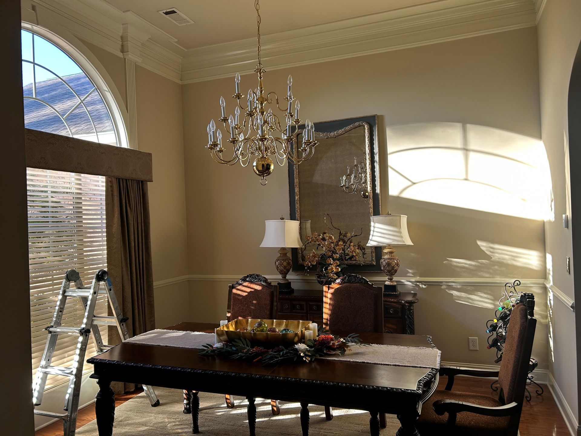 home window tinting service - SPF Ultra Tint blocks bright UV Sun glare through transom windows in Millbrook AL