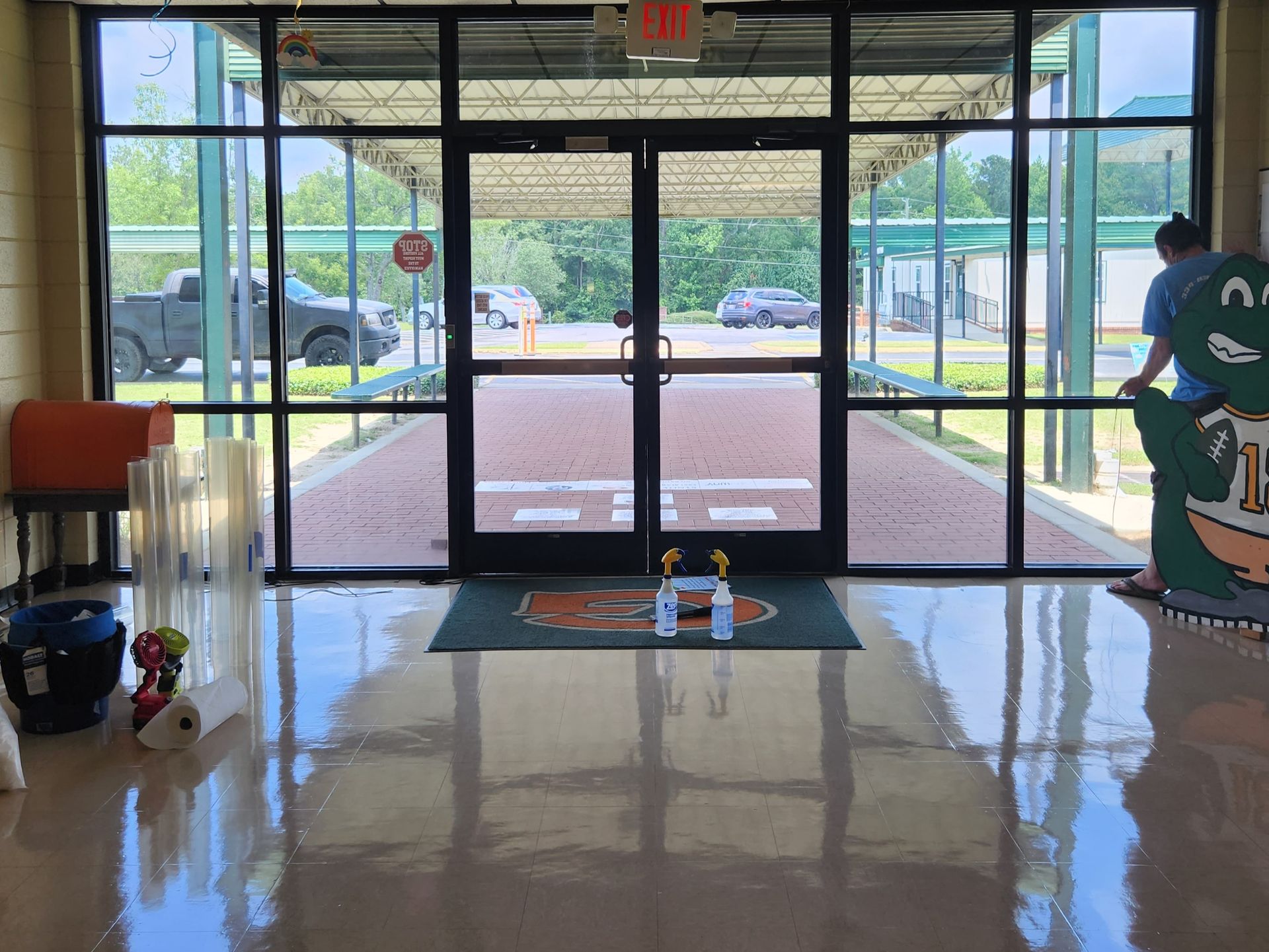 Security film in Auburn Opelika Smiths Station AL - the school is protected from an armed attack break-in or forced entry. Additionally Solar Heat gain and Sun glare was cut adding comfort with visual clarity inside.
