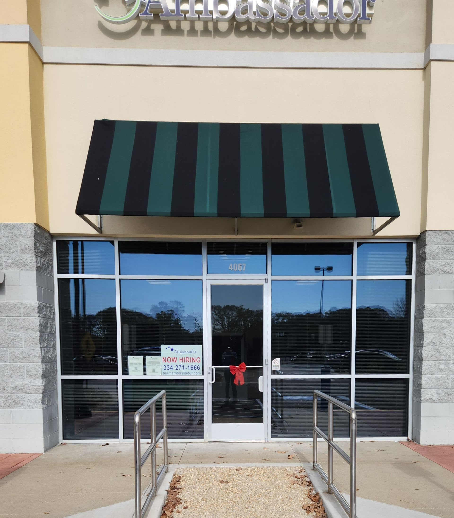 store window tinting - Heat with bright Sun flooded inside the storefront windows prior to SPF Ultra Tint at Ambassador in  Montgomery