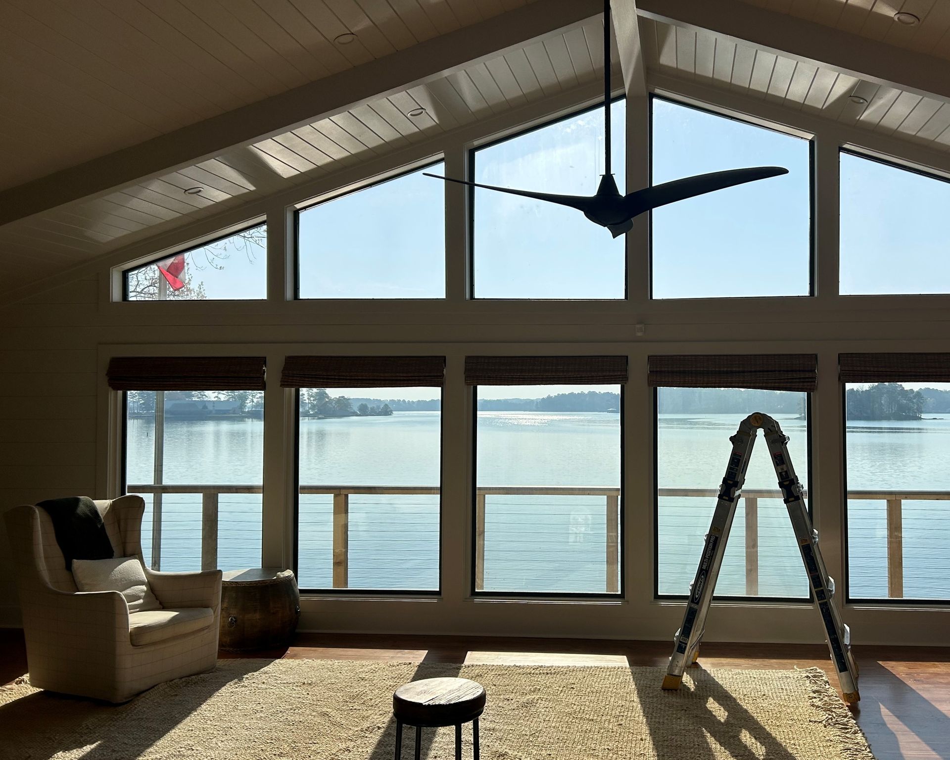 lake home window tinting - A two-way clear tint option was needed to block UV Sun from flooding the home windows in Equality AL