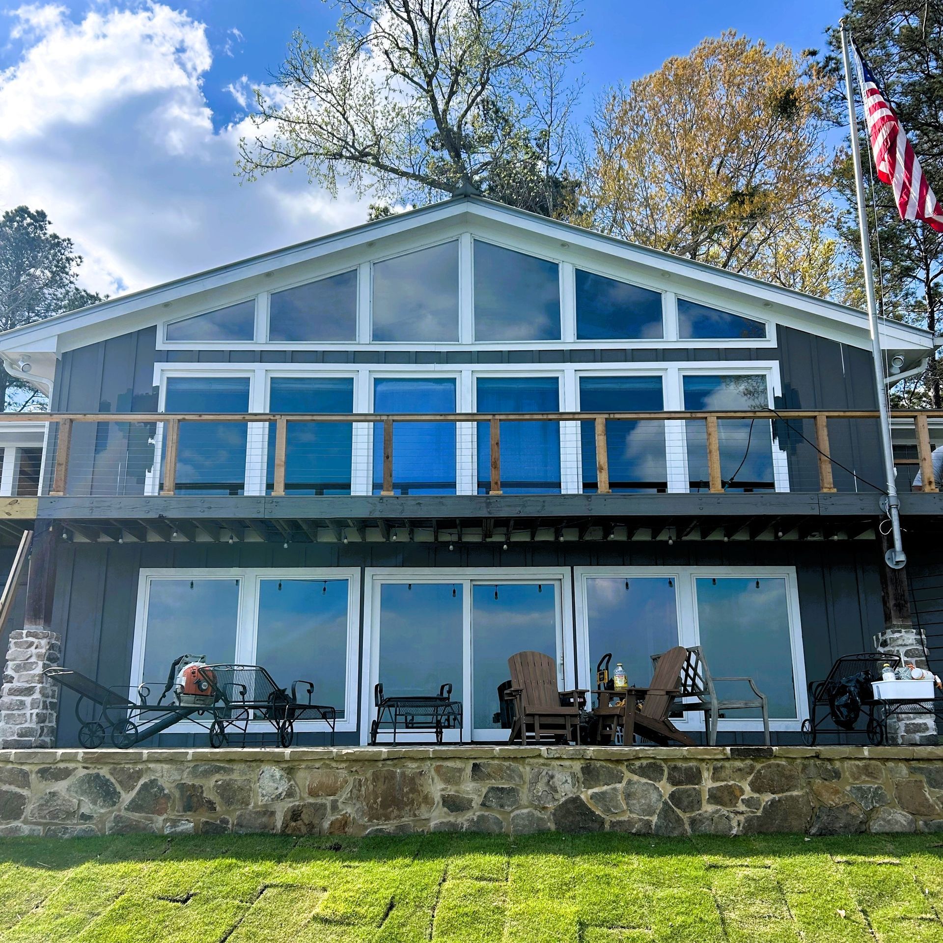 Lake home window tinting - SPF Crystal Clear Tint blocks half the heat along with over ninety-nine percent UV-Radiation inside this Lake Martin home. Equality AL