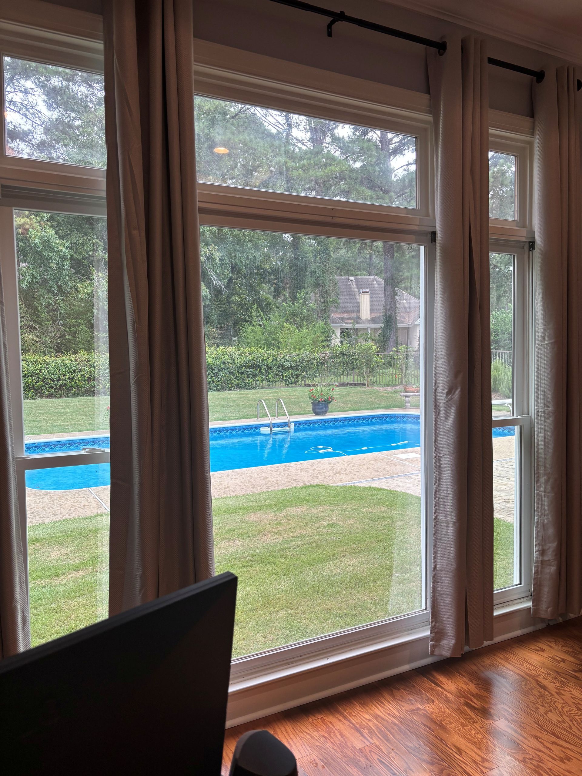 home window tinting - SPF Platinum Tint renews home windows stopping bright UV Sun with heat gain in Montgomery AL