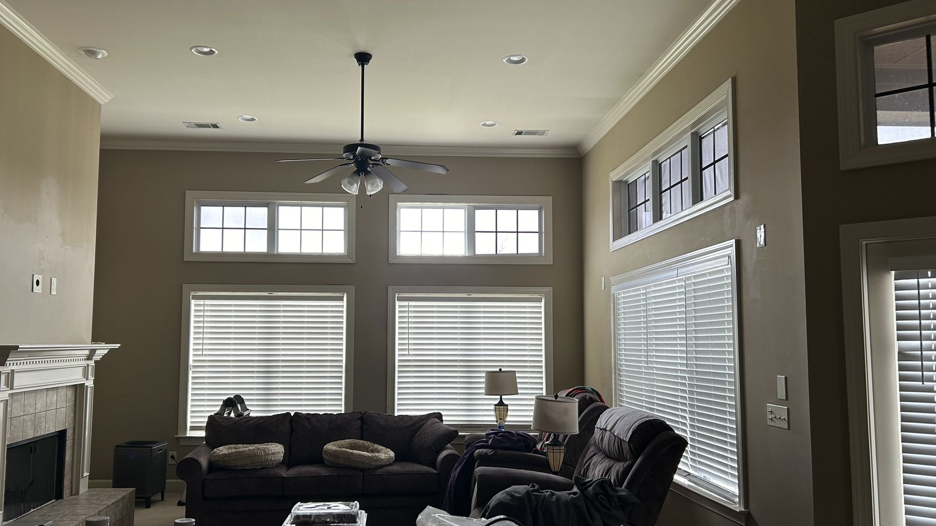 residential window tinting in Deer Creek - The bright Sun glare and heat gain were too much for the screens on these home transoms windows to control.