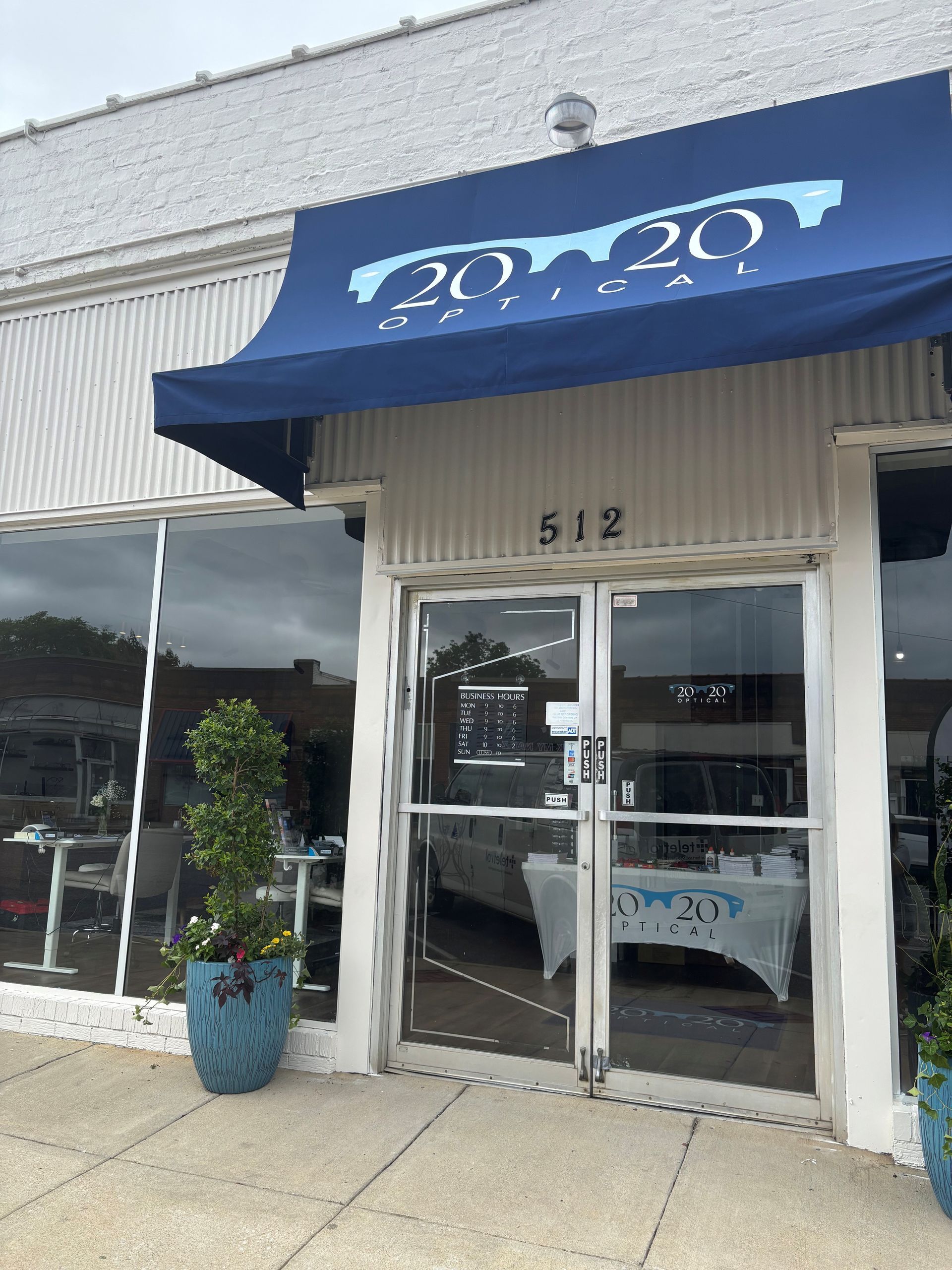 storefront window tinting - SPF Crystal Clear Tint blocked half heat gain while keeping two-way viewing. Bessemer AL