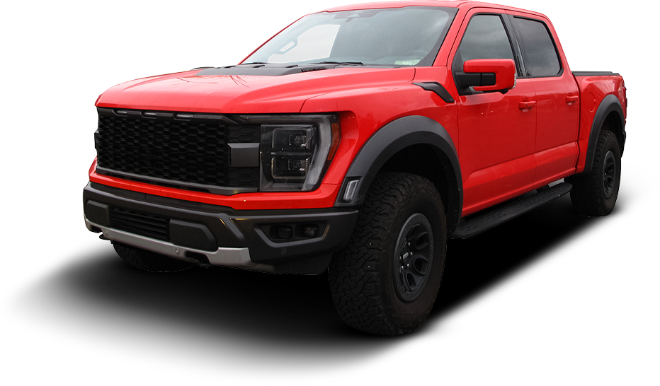 A red pickup truck is sitting on a white background | Huber Automotive