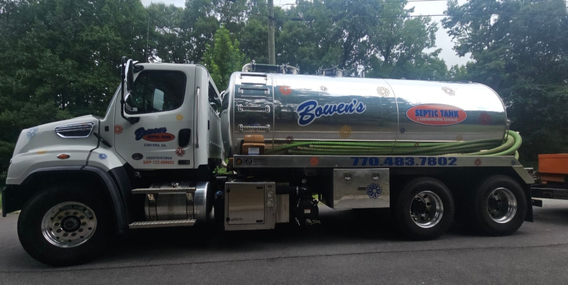 A silver truck with the word braves on the side