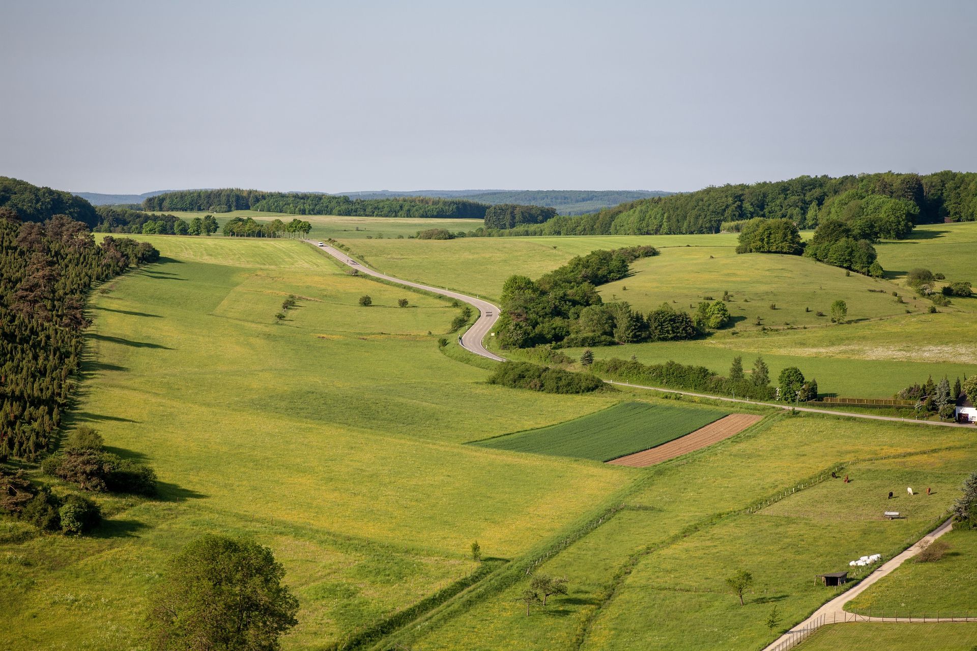 aerial shot farmland and clear sky
