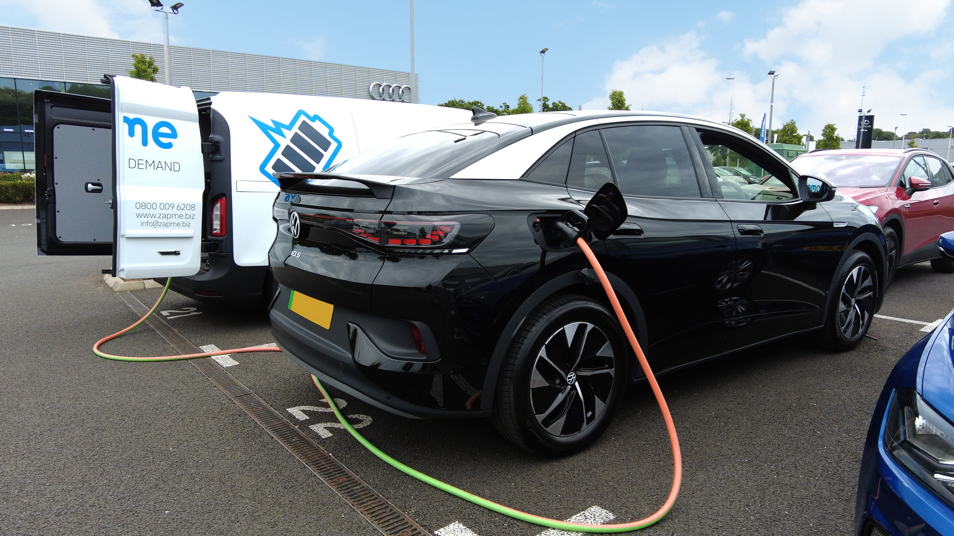 mobile charging a VW id.4 in black