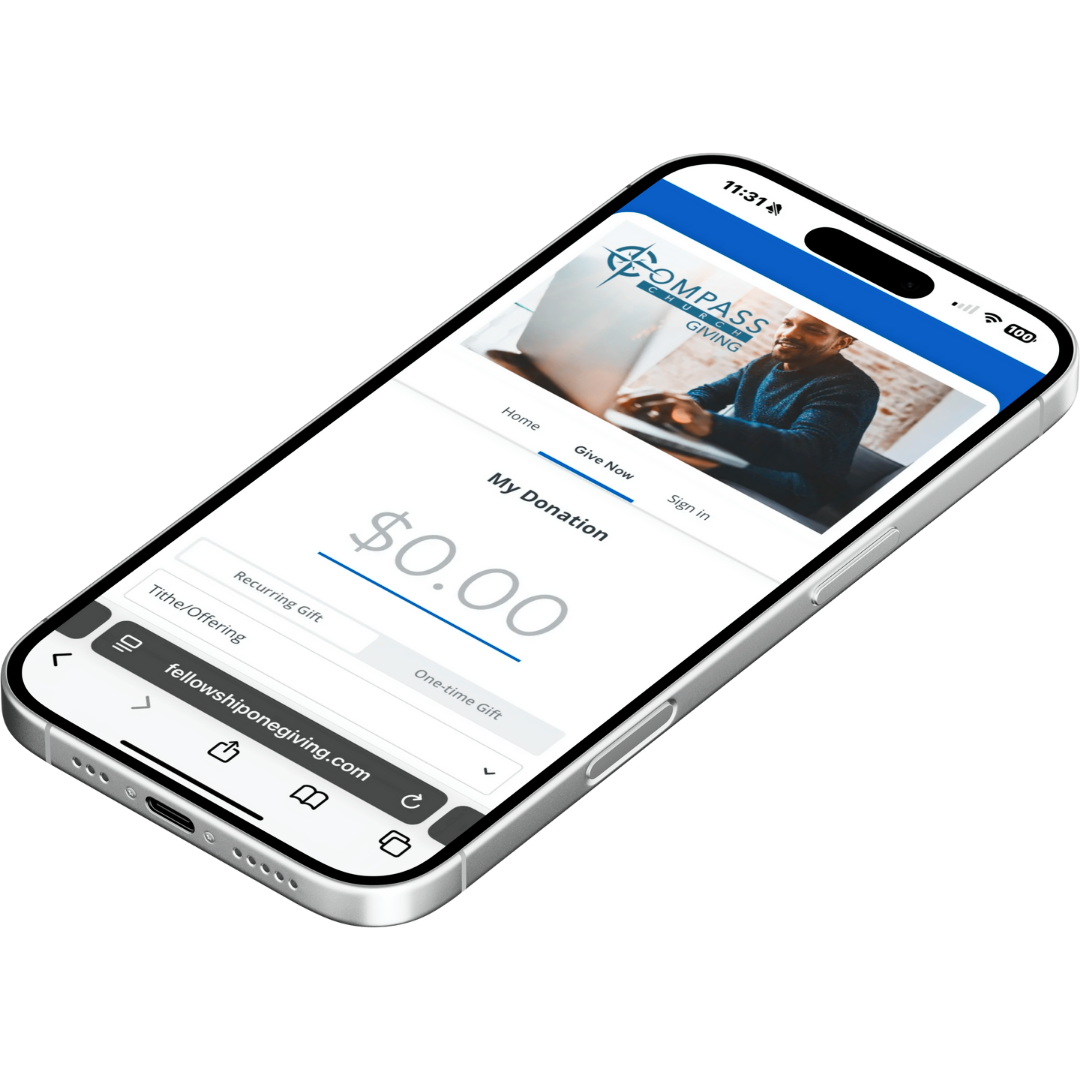 A cell phone with a picture of a man using a laptop on the screen.