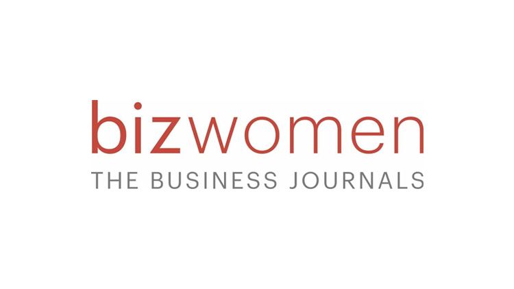 Ron Shaich is smiling in front of a panera bread store