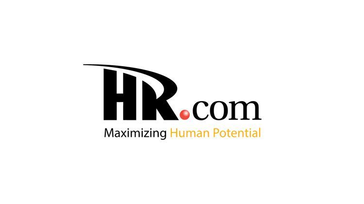 Ron Shaich is smiling in front of a panera bread store