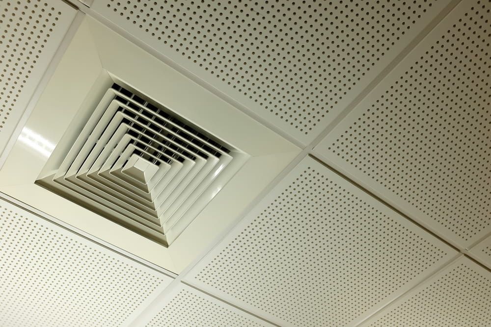A Ceiling With Holes in It and a Vent in the Middle — Refrigerated Technologies (QLD) Pty Ltd In Collinsville, QLD