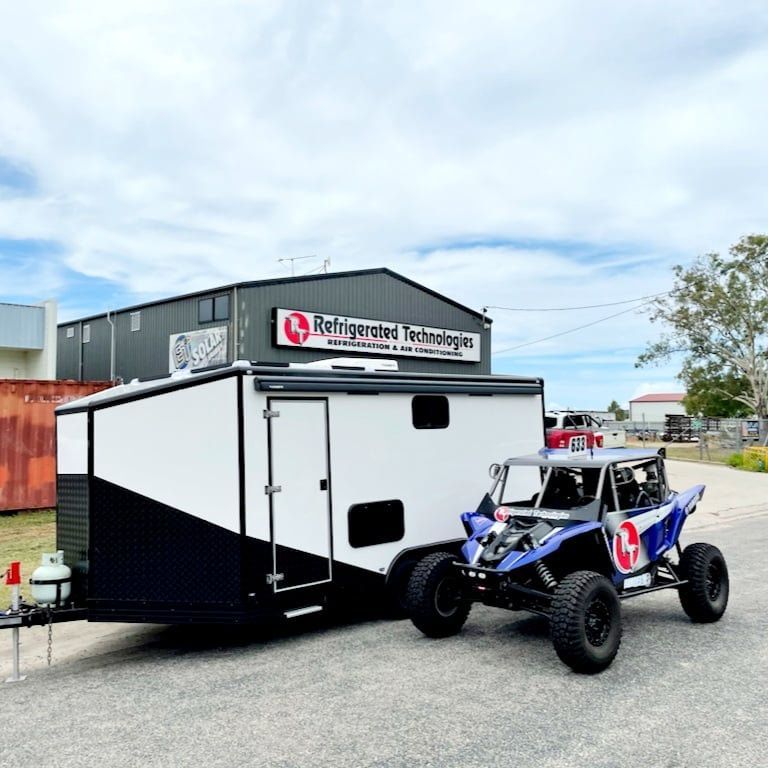 Two atvs are parked next to a trailer that says refrigerated technologies — Refrigerated Technologies (QLD) Pty Ltd In Bowen, QLD
