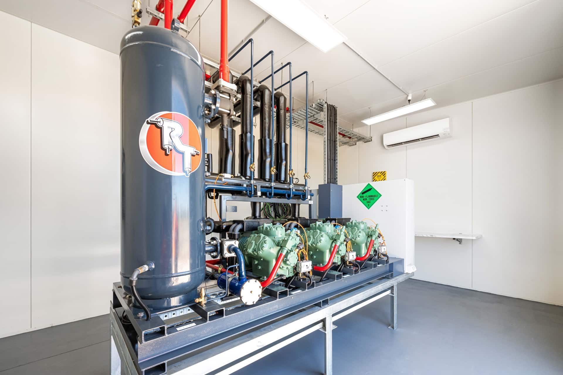 A Large Machine is Sitting on Top of a Table in a Room — Refrigerated Technologies (QLD) Pty Ltd In Bowen, QLD