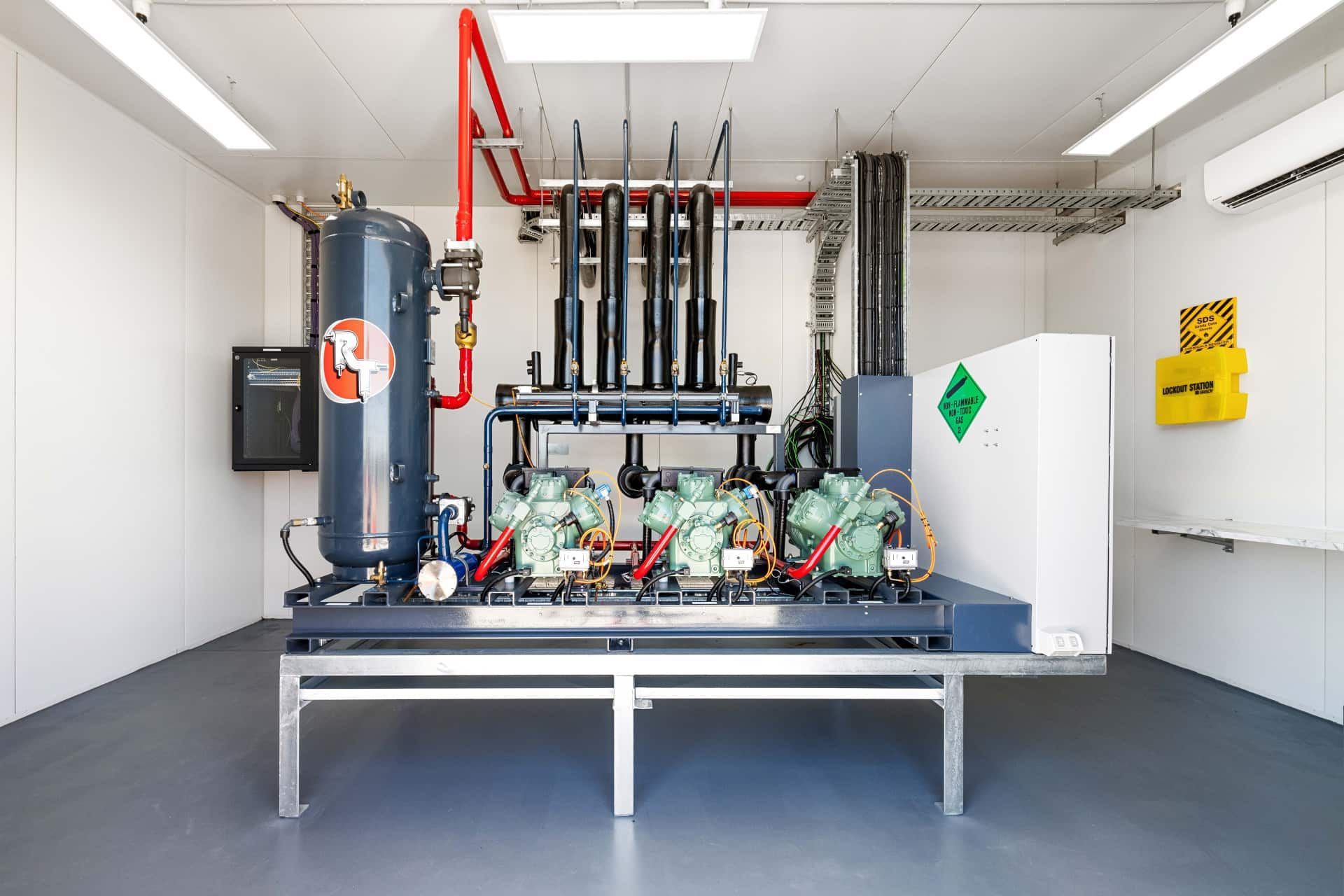 A Room With a Lot of Pipes and a Machine on a Table — Refrigerated Technologies (QLD) Pty Ltd In Bowen, QLD