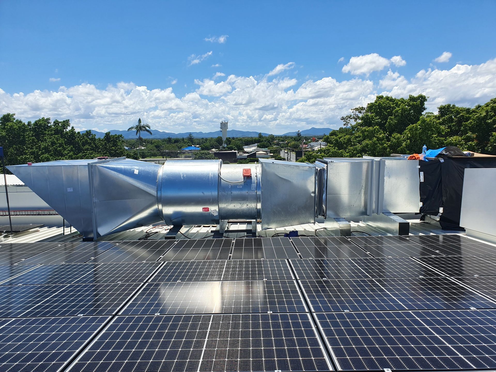 A White Air Conditioner Leaking Water on a White Wall — Refrigerated Technologies (QLD) Pty Ltd In Bowen, QLD