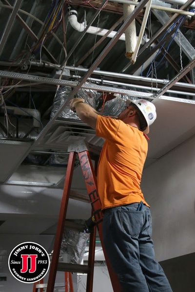 Electrician Working On Air Conditioner — Killeen, TX — CWS Services